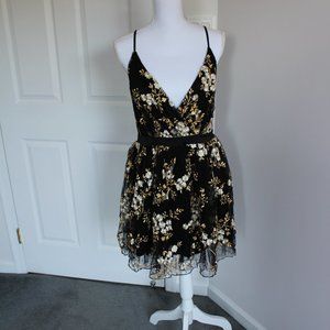 Express black, white, and gold flower low cut mini dress size 8